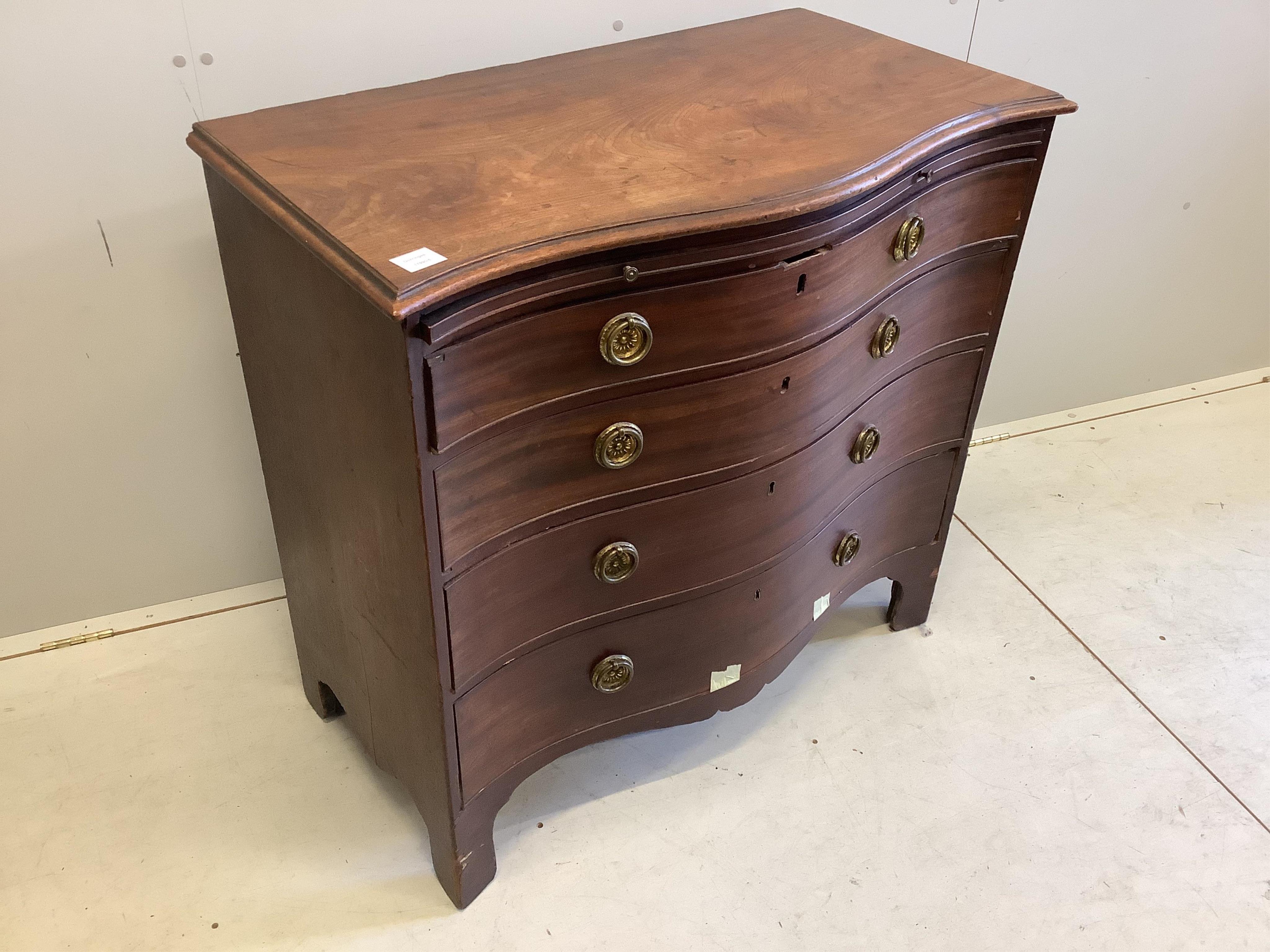 A George III mahogany serpentine chest with brushing slide, width 95cm, depth 52cm, height 91cm